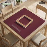Plain burgundy square mahjong mat with scalloped edges on a white background.