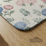 Pink floral mahjong table mat with peonies, blue hydrangeas, sage green leaves, and an ivory background.