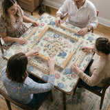 Pink floral mahjong table mat with peonies, blue hydrangeas, sage green leaves, and an ivory background.