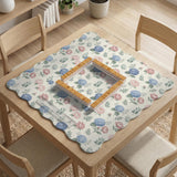 Pink floral mahjong table mat with peonies, blue hydrangeas, sage green leaves, and an ivory background.