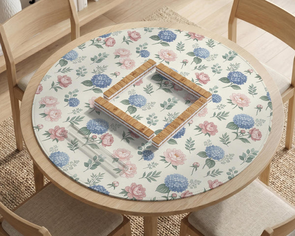 Pink floral mahjong table mat with peonies, blue hydrangeas, sage green leaves, and an ivory background.