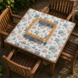 Pink floral mahjong table mat with peonies, blue hydrangeas, sage green leaves, and an ivory background.
