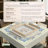 A square mahjong mat with blue hydrangea flowers, green vines, a cream background, a striped center, and printed rules around the border.