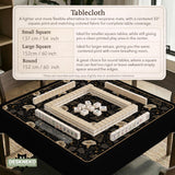 Black square mahjong mat with moths, moonflowers, crescent moons, and scattered stars in a celestial floral pattern.