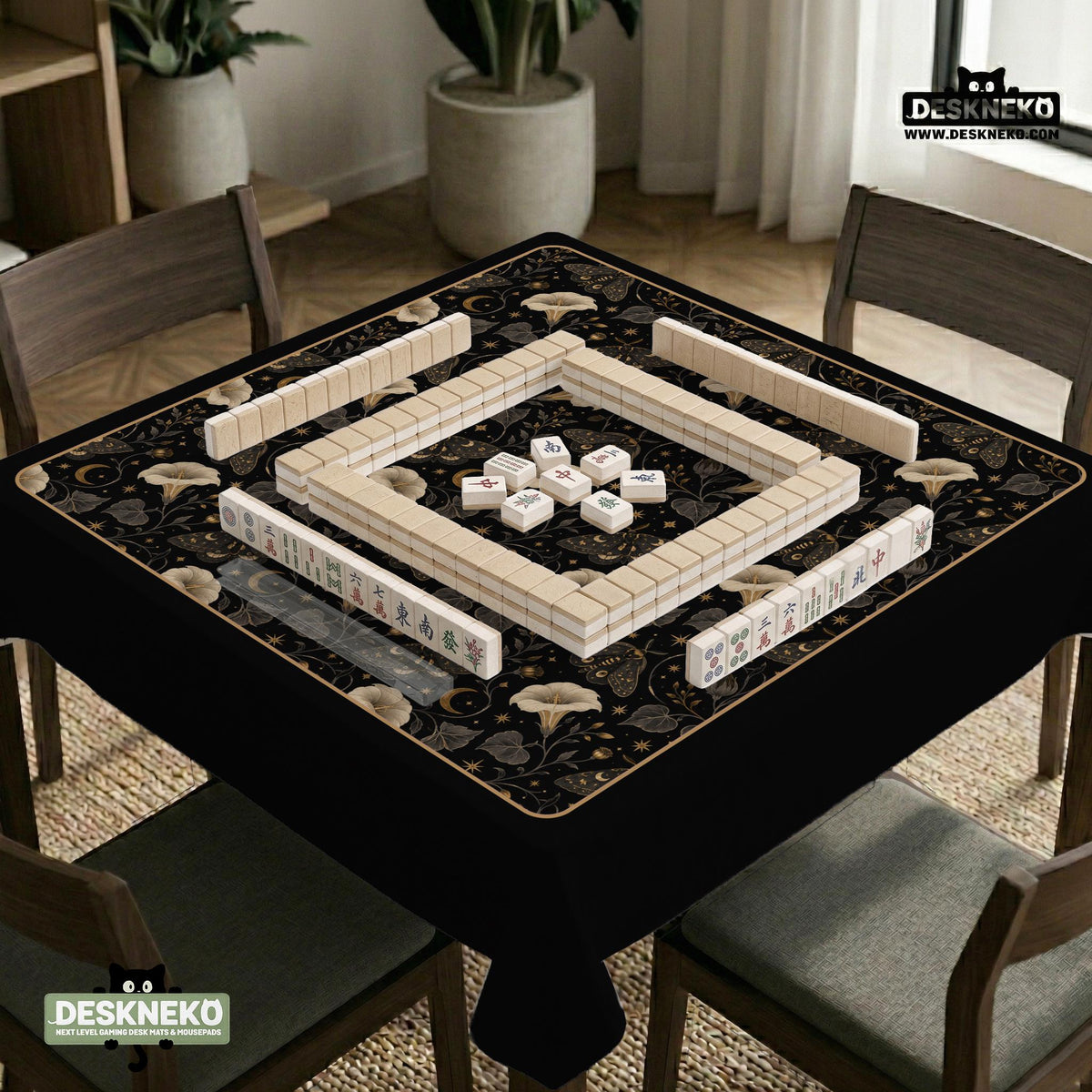 Black square mahjong mat with moths, moonflowers, crescent moons, and scattered stars in a celestial floral pattern.