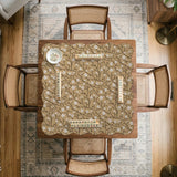 Beige mahjong mat with a white blossom branch floral pattern on a neutral background.