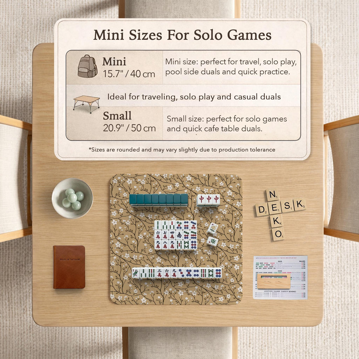 Beige mahjong mat with a white blossom branch floral pattern on a neutral background.