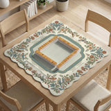 Square mahjong mat with a cream background, blue birds, sage leaves, terracotta flowers, and a decorative botanical border with printed rules text.