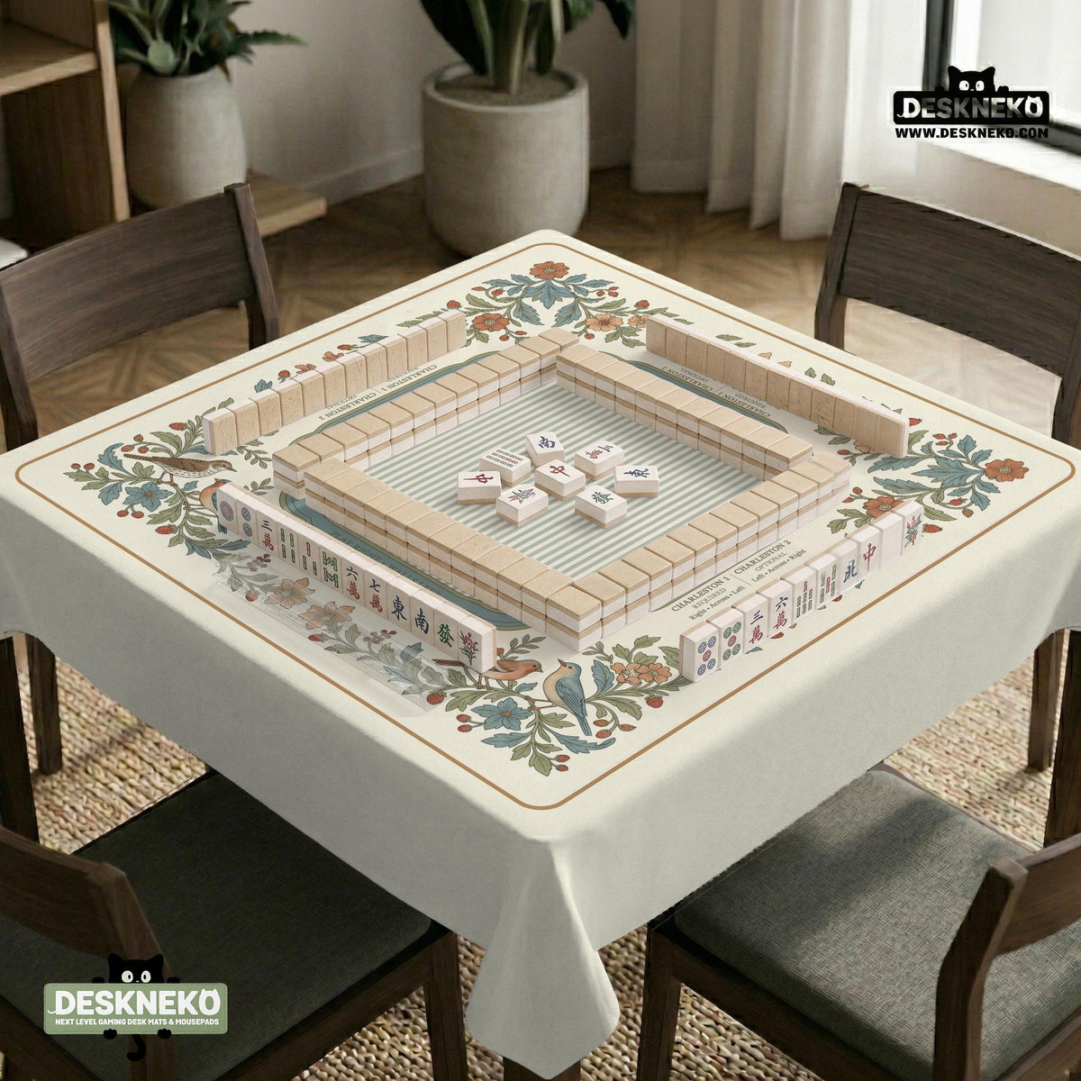 Square mahjong mat with a cream background, blue birds, sage leaves, terracotta flowers, and a decorative botanical border with printed rules text.