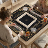 Black mahjong mat with gold dragon artwork, a scalloped edge, and printed Mahjong rules on the surface.