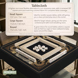 Black mahjong mat with gold dragon artwork, a scalloped edge, and printed Mahjong rules on the surface.