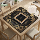Black mahjong mat with gold dragon artwork, a scalloped edge, and printed Mahjong rules on the surface.