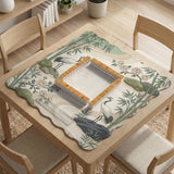 Square mahjong mat with a cream background, sage green cranes, bamboo leaves, peony branches, stones, and thin linework.