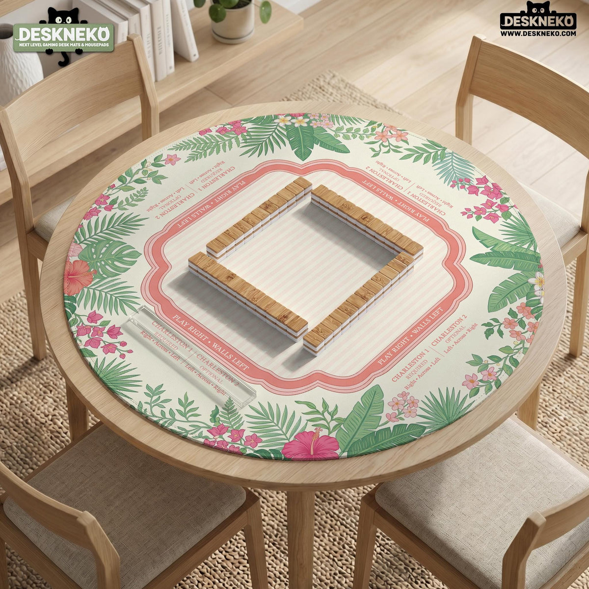 Coral tropical floral mahjong mat with hibiscus flowers, palm leaves, cream sections, and a scalloped edge.