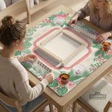Coral tropical floral mahjong mat with hibiscus flowers, palm leaves, cream sections, and a scalloped edge.