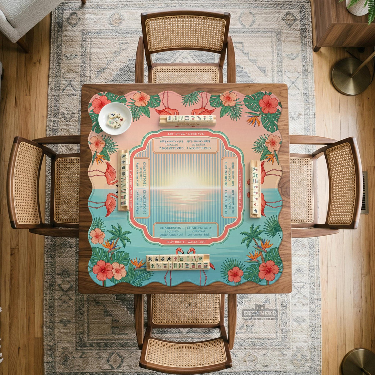 Pink mahjong mat with flamingos, palm leaves, hibiscus flowers, and aqua tropical background.