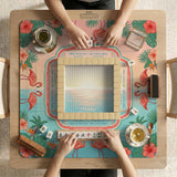 Pink mahjong mat with flamingos, palm leaves, hibiscus flowers, and aqua tropical background.