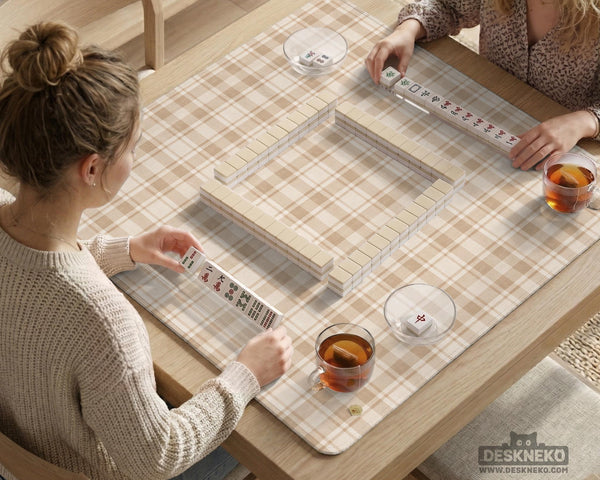 Beige plaid mahjong mat with a cream tartan pattern on a neutral background.