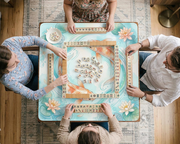 A soft blue mahjong mat with koi fish, floating lily pads, pale floral details, and a watercolor-style pond design.