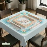A soft blue mahjong mat with koi fish, floating lily pads, pale floral details, and a watercolor-style pond design.