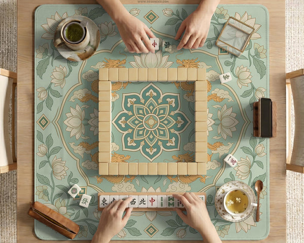 Sage green square mahjong mat with lotus flowers, golden dragons, and an ornamental center design.