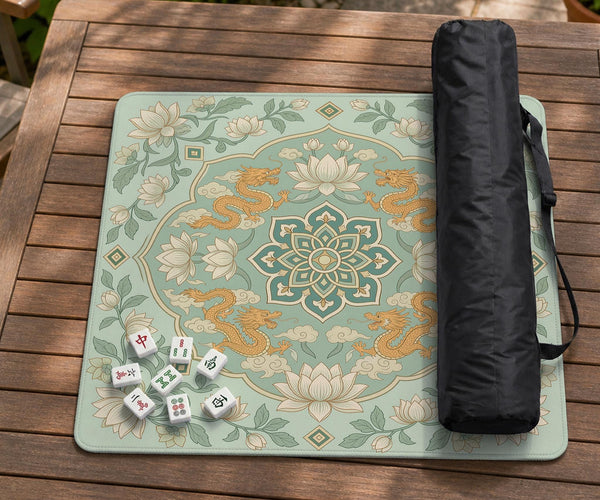 Sage green square mahjong mat with lotus flowers, golden dragons, and an ornamental center design.