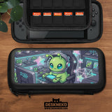 A Switch carrying case design with a cute green alien at a gaming desk, glowing cyan lights, and pastel stars on a dark background.