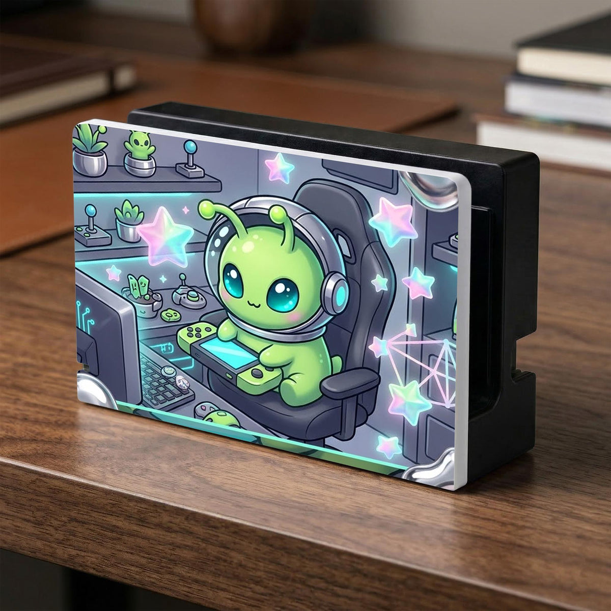 A Switch carrying case design with a cute green alien at a gaming desk, glowing cyan lights, and pastel stars on a dark background.