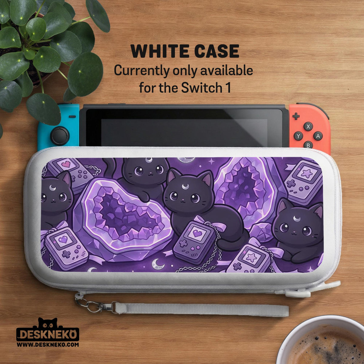 Purple carrying case with black cat faces, moon shapes, stars, and crystal geode style artwork for Nintendo Switch.
