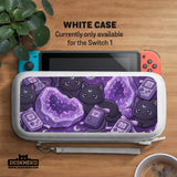 Purple carrying case with black cat faces, moon shapes, stars, and crystal geode style artwork for Nintendo Switch.