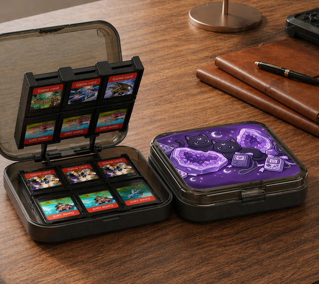 Purple carrying case with black cat faces, moon shapes, stars, and crystal geode style artwork for Nintendo Switch.