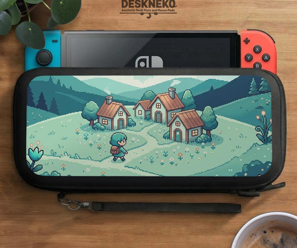 Teal carrying case with a pixel-style village scene, small houses, layered mountains, flowers, and a retro game-inspired landscape design.