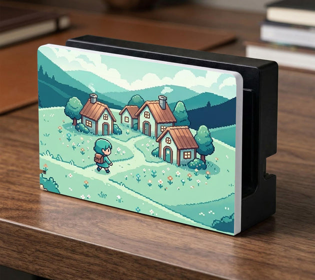 Teal carrying case with a pixel-style village scene, small houses, layered mountains, flowers, and a retro game-inspired landscape design.