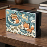 Blue Switch carrying case with cute fox characters, moon and star details, and small potted plants with beige accents.