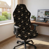 Black chair cover with a moth, moon, and flower pattern in gold, ivory, and dark botanical tones.