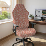 Pink chair cover with a botanical floral print shown on an office chair, with matching armrest covers and multiple cover style options.