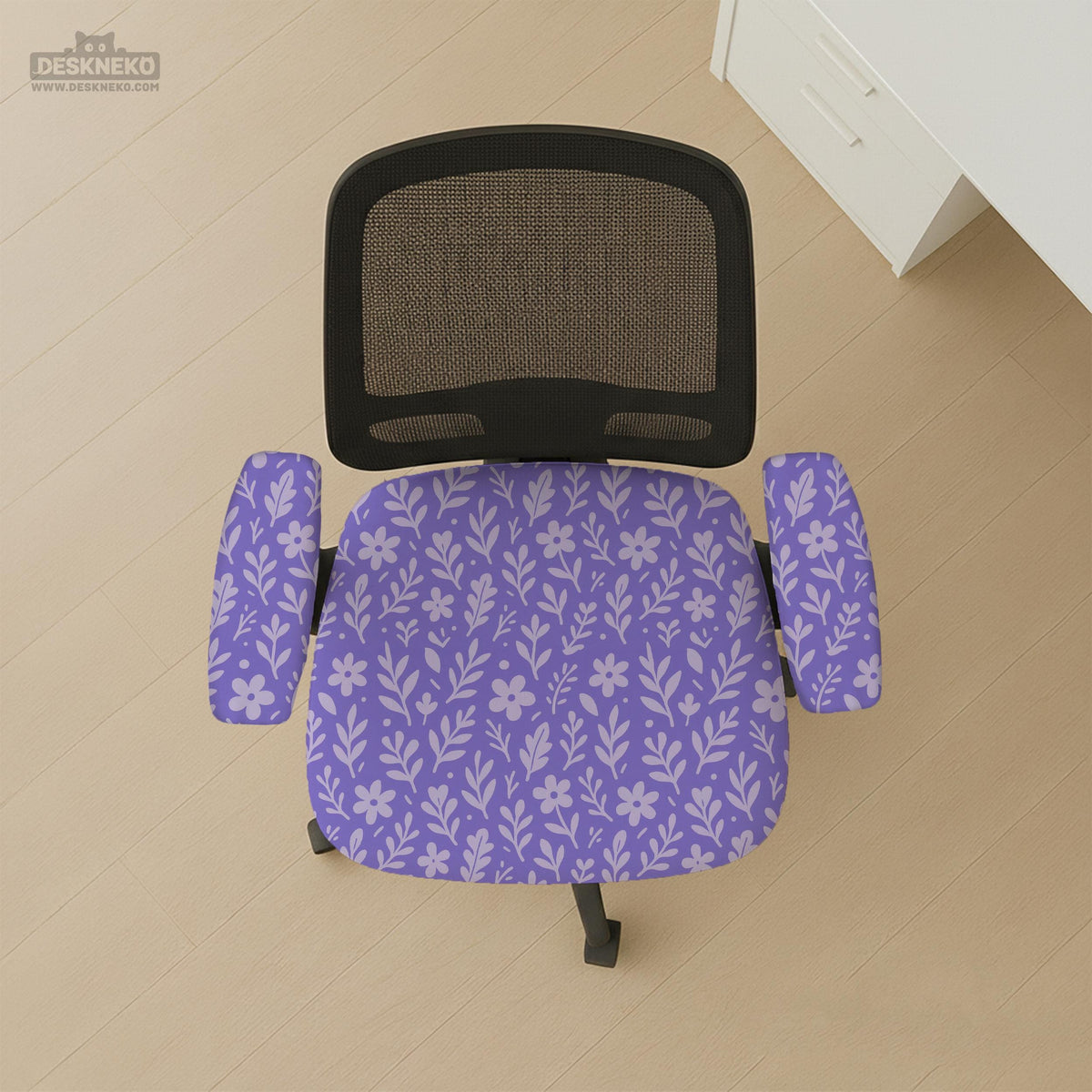 Purple desk chair cover with a botanical floral pattern shown in multiple slipcover options for full chair, back and seat, seat-only, and armrest-only coverage.
