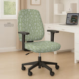 Green chair cover with a small botanical floral print in sage and cream.