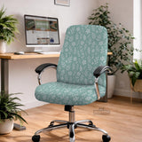 Sage and aqua green floral chair cover shown on a gaming chair with matching armrest covers.