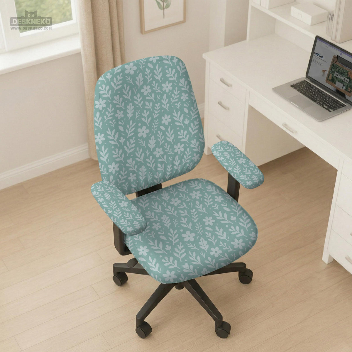 Sage and aqua green floral chair cover shown on a gaming chair with matching armrest covers.