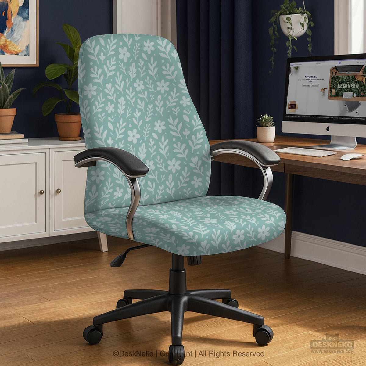 Mint and white botanical desk chair cover with a floral leaf pattern shown on an office chair.