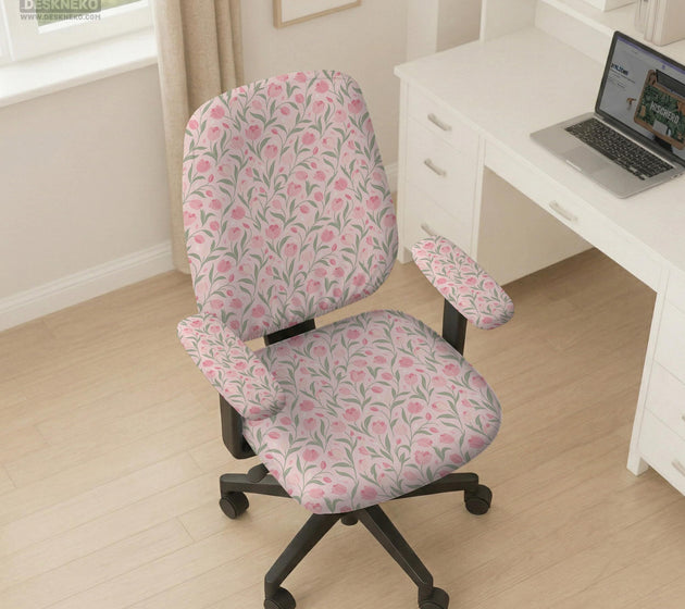 Pink chair cover with a tulip floral print shown as a desk chair slipcover, with armrest covers and size options.