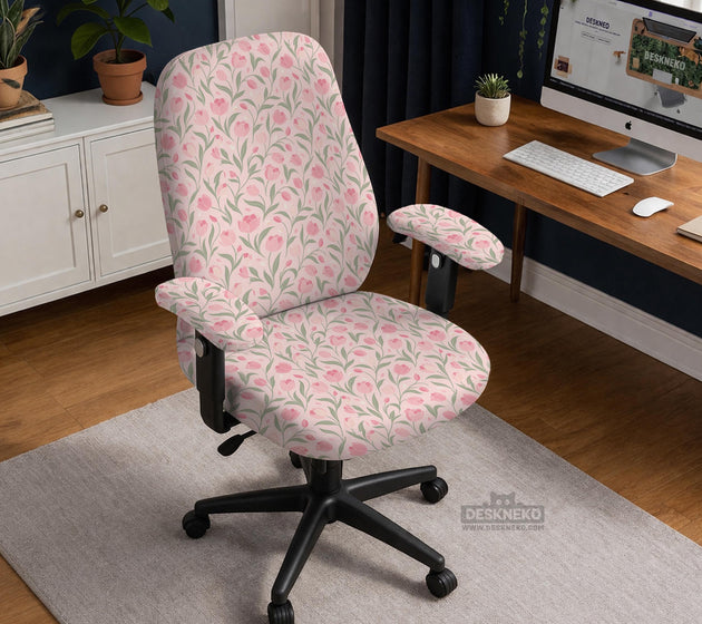 Pink chair cover with a tulip floral print shown as a desk chair slipcover, with armrest covers and size options.