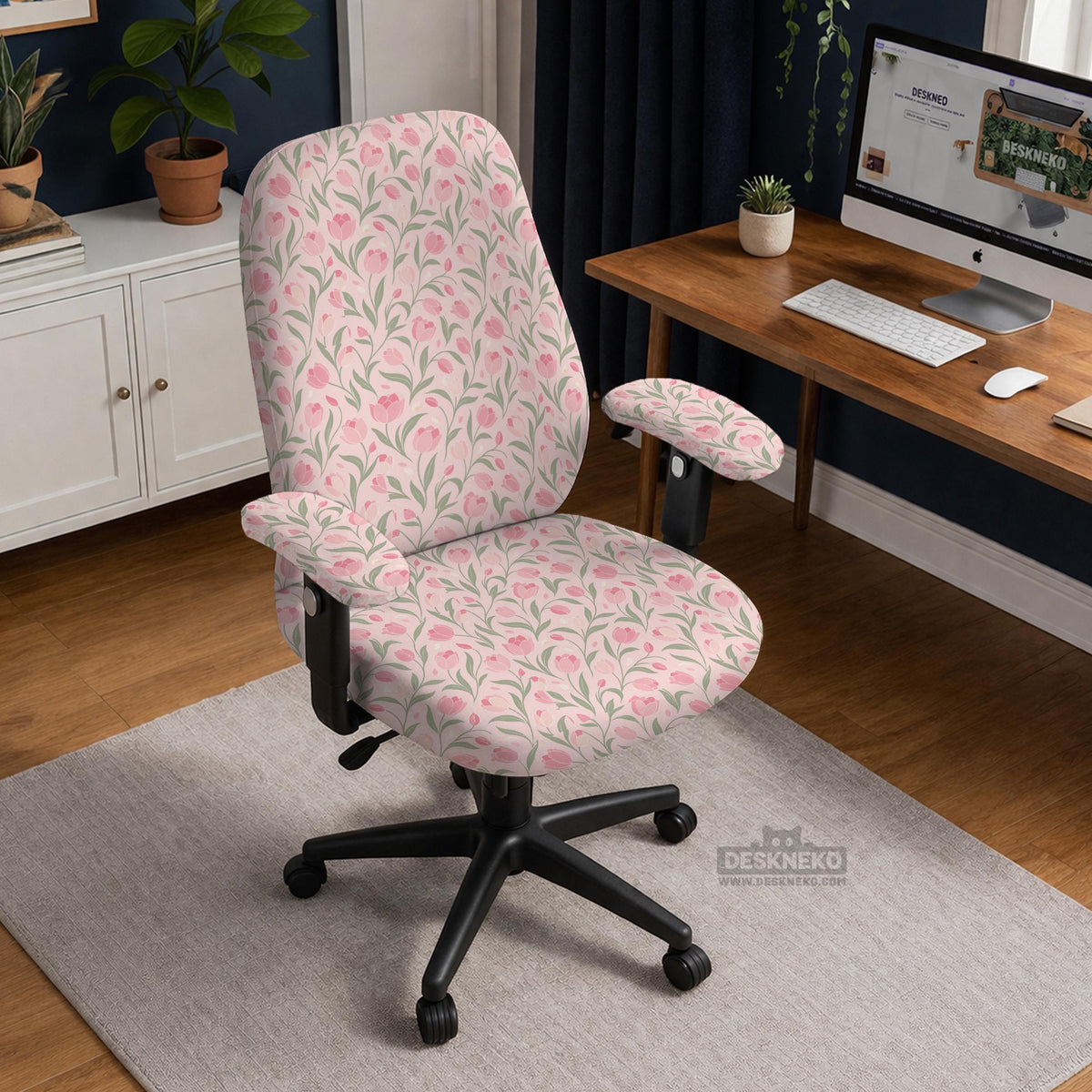 Pink chair cover with a tulip floral print shown as a desk chair slipcover, with armrest covers and size options.