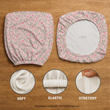 Pink chair cover with a tulip floral print shown as a desk chair slipcover, with armrest covers and size options.