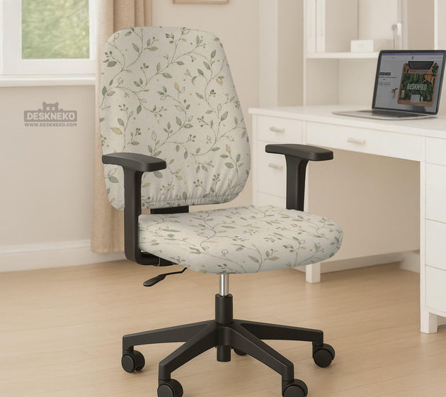 Cream floral chair covers with muted sage leaves and fine vine details on an ivory background, shown as multiple slipcover options for chair backs, seats, and armrests.
