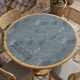 Blue mahjong mat with a dusty linen-look background and small leafy botanical stems in a floral pattern.