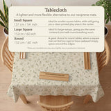 Sage green mahjong mat with vine and botanical artwork in cream neutral tones, shown in a cottagecore style with a tablecloth-style format.