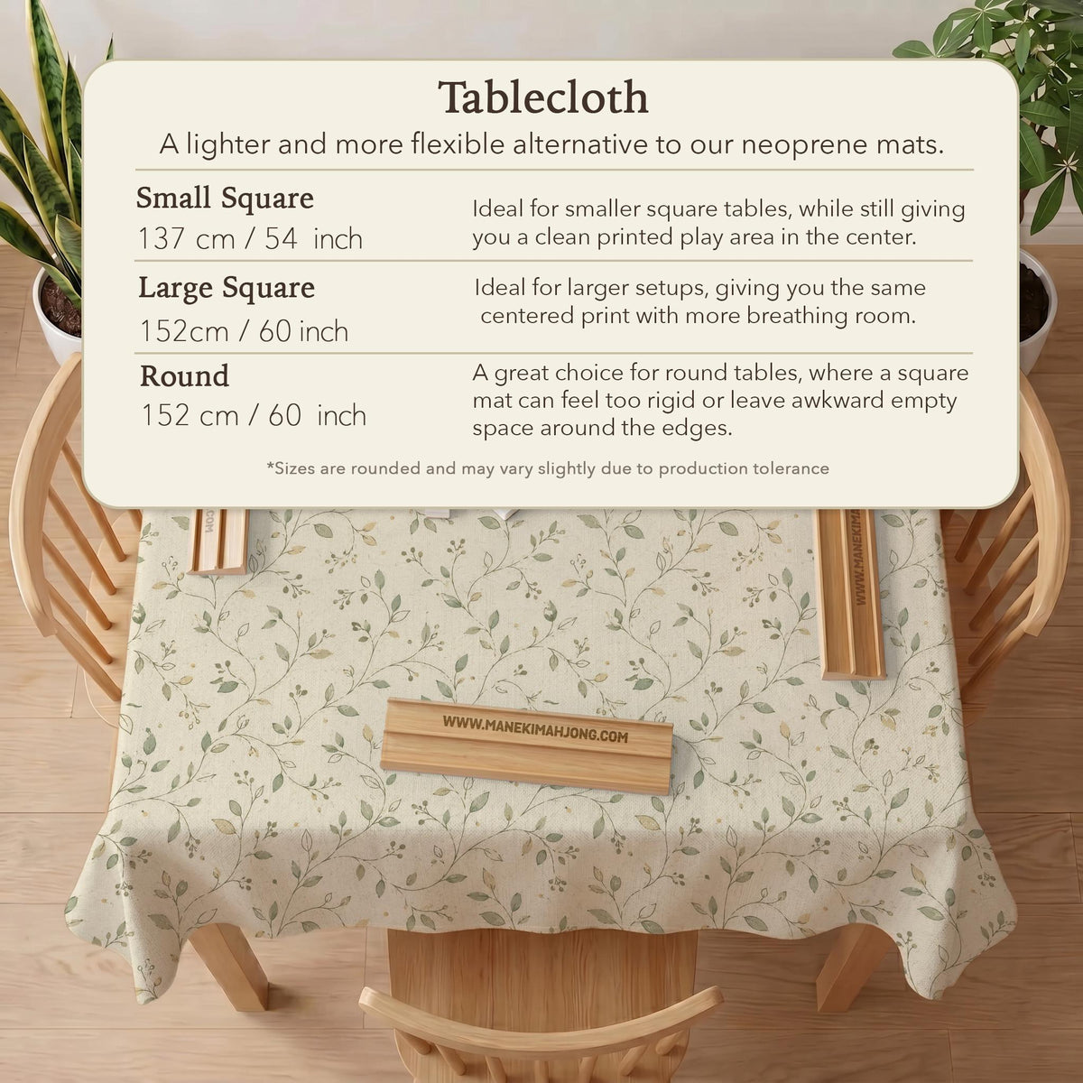 Cream square mahjong mat with a sage vine and leaf botanical pattern and scalloped edges.