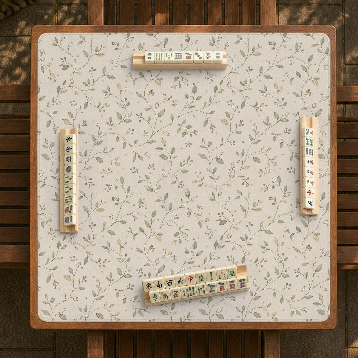 Sage green mahjong mat with vine and botanical artwork in cream neutral tones, shown in a cottagecore style with a tablecloth-style format.
